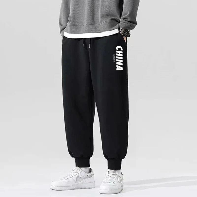 man Men's Casual Pants Leisure sanitary pants men autumn winter new Korean version thick bound feet trendy printed plush pants Colouronova