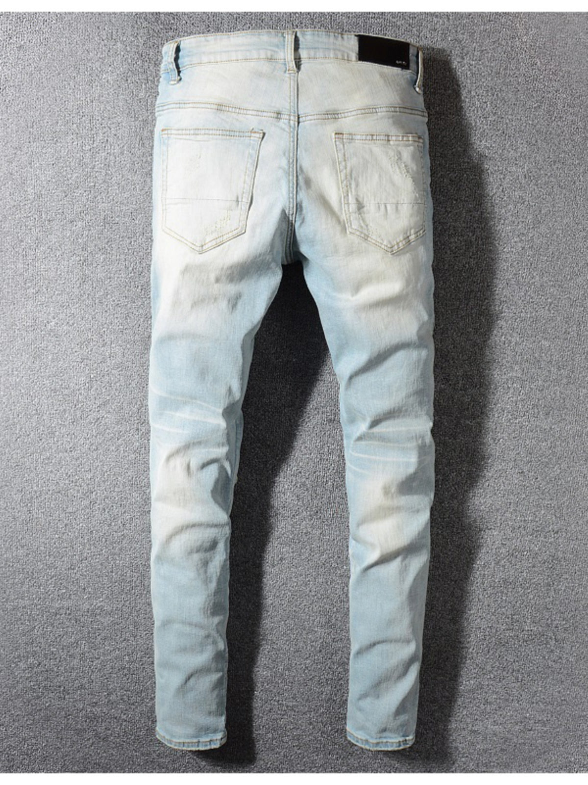 Hole-repaired denim pants Colouronova